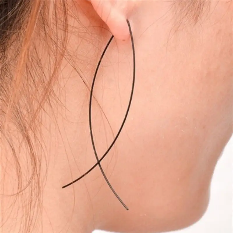 Fashionable, minimalist, abstract art, fishing line, crossed earrings, metal flowing design, sensory ear line