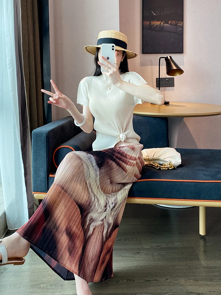 Vrouwen bedrukte halve rok 2025, zomer nieuwe hoge taille, casual losse grote maat stretch casual mode vrouwelijke halve rok