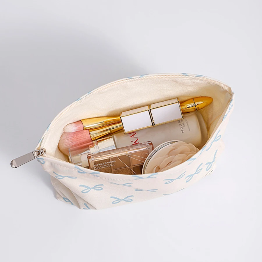 حقيبة مكياج بسحاب مطبوع عليها نمط فيونكة مصممة بشكل بسيط، حقيبة تخزين مستحضرات التجميل خفيفة الوزن ومتعددة الوظائف للنساء