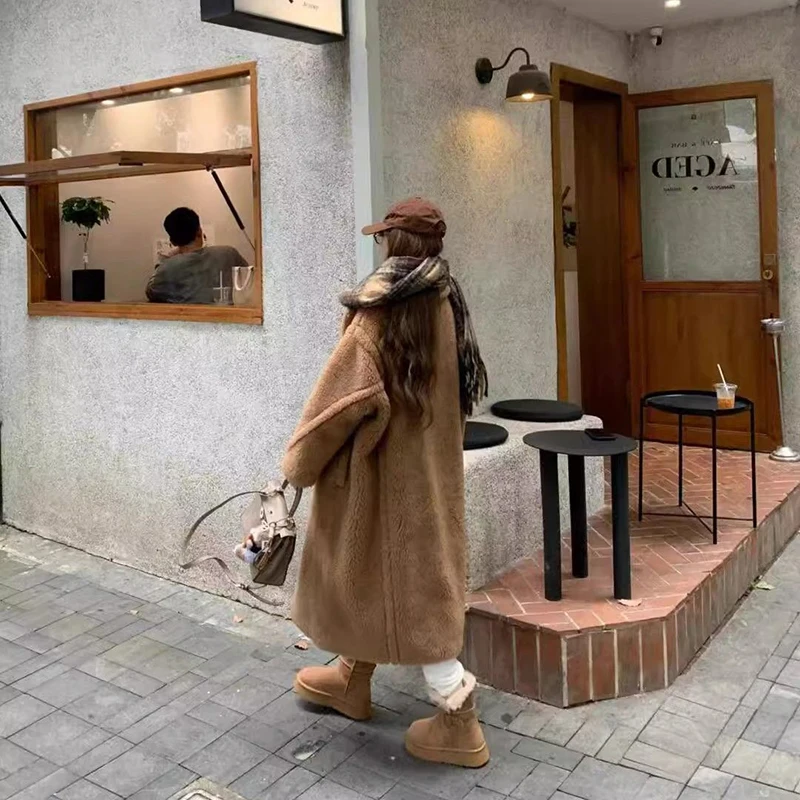 Chaqueta elegante de piel para mujer, abrigo de otoño e invierno, nuevo abrigo peludo, Parka cálida gruesa de largo medio holgado a la moda 2025