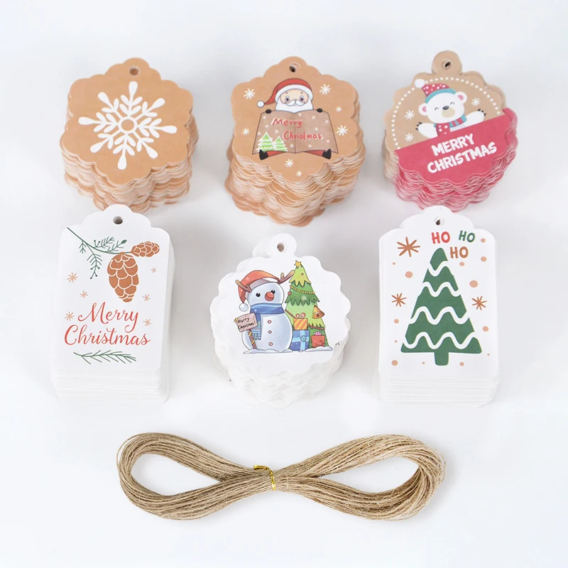 

100pcs Merry Christmas Gift Tags with Strings Xmas Decor Printed Paper Cards Labels 2023 Christmas Decoration Packaging Supplies