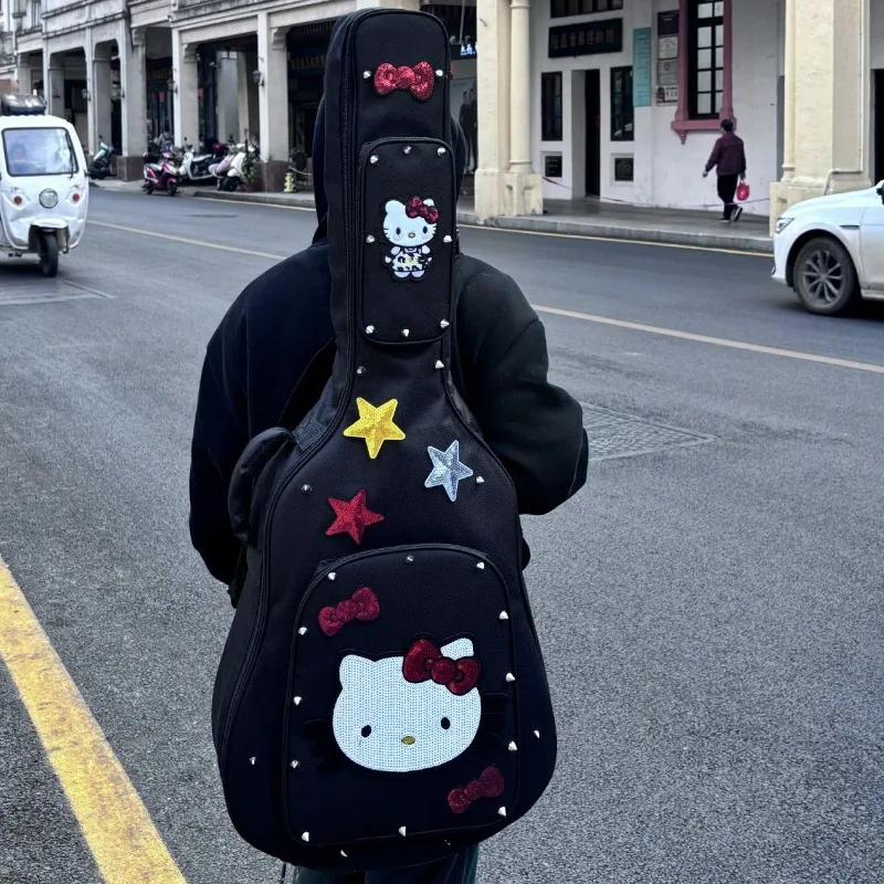

Hello Kitty Black Electric Acoustic Guitar Thick Anti-collision Backpack Handmade Folk Acoustic Guitar Cute Cartoon Backpack.