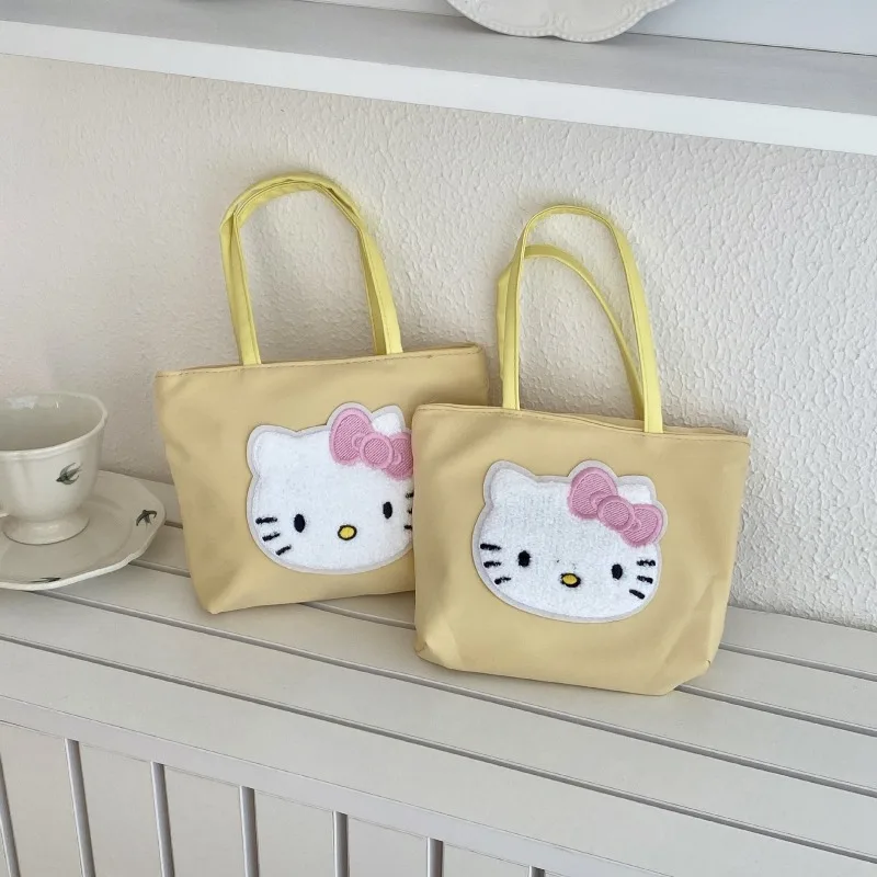 

Cute Hello Kitty Handbag Travel Essential Portable Handbag Small and Lightweight Versatile Canvas Small Bag Wholesale for Women