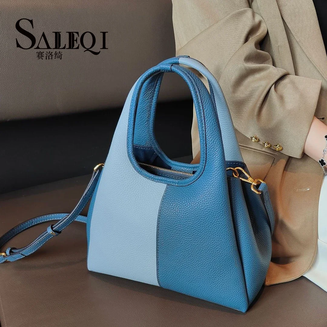 Genuine leather New vegetable basket handbag  simple and versatile  The Korean version of the contrasting color commuting bag