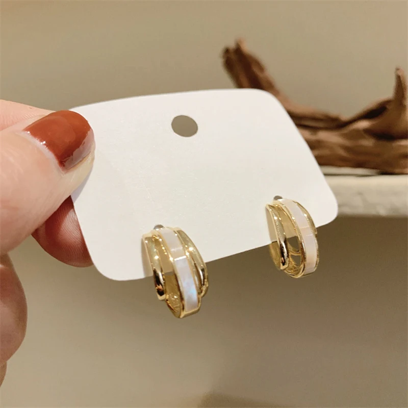 Geometry Hollow Out C Shape Drop Earrings for Women Golden Color Metal Twist Dangle Earrings White Enamel Oil Simple Jewelry