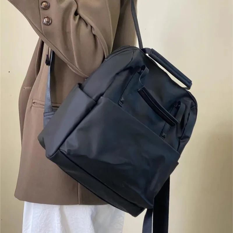 حقيبة ظهر JIAERDI من النايلون الأسود للنساء مقاومة للماء وخفيفة الوزن وسعة كبيرة حقيبة يد عصرية متعددة الاستخدامات للتنقل اليومي #6