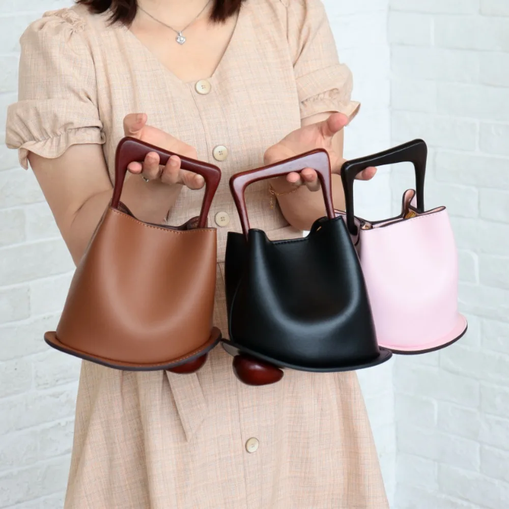 New Cowhide Genuine Leather Minority Korea Handbags Commuter Women Simple All-match Bucket Large Capacity Advanced Shoulder Bag