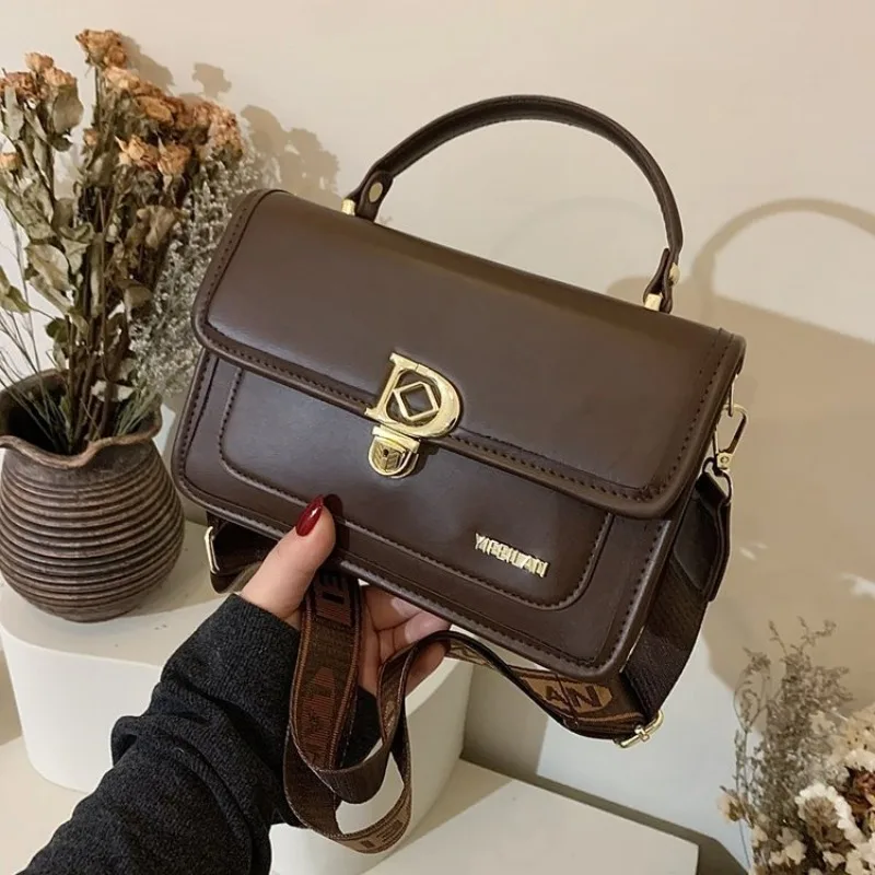 

Sleek Minimalist Diaper Bag Handbag Crossbody Office Meeting Exquisite Professional Versatile Chic Practical Modern