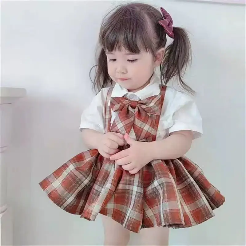 Girl JK Set 2026 New Summer Baby clothes set Children's Academy Style Short sleeved Shirt+Strap Skirt 2-piece Set