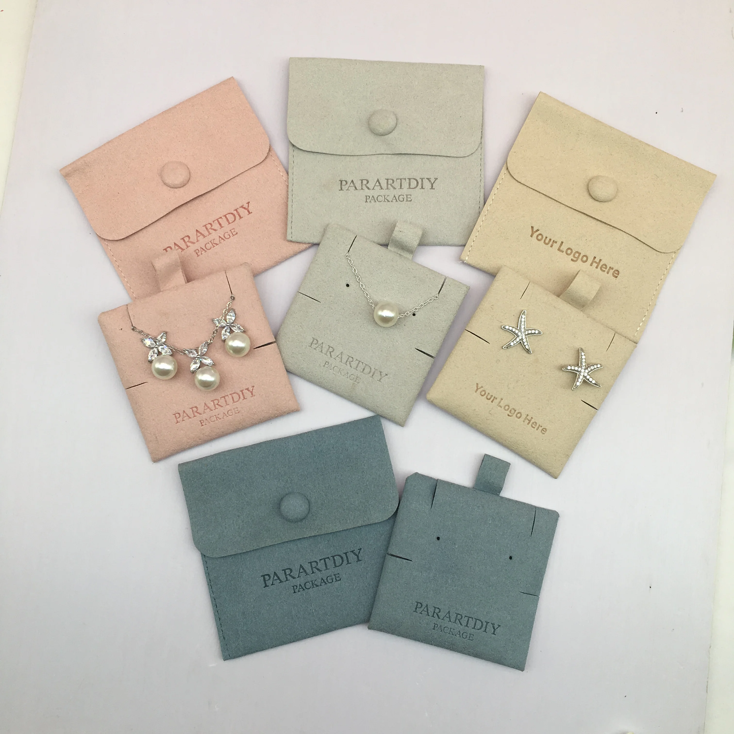 

Мешочек для ювелирных изделий из микрофибры с держателем и тиснением под заказ