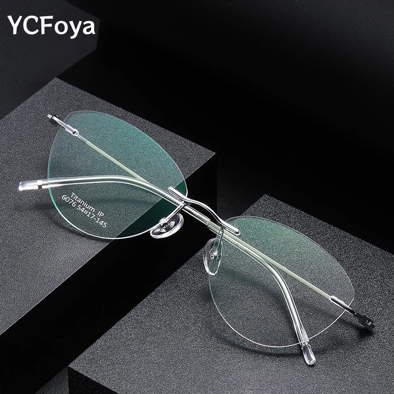 

YCFoya Fashion Retro Cat Eye Women Frameless Glasses Ultra-light Titanium Retouch Face Optical Prescription Eyewear 6076