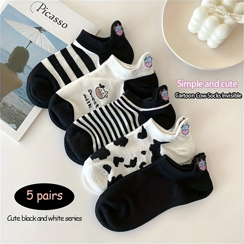 

5 pairs of women's anime cow pattern socks with anti slip grip, black and white color matching, soft and comfortable short socks