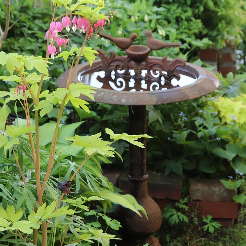 

cast iron bird food basin outdoor garden garden decoration ornament