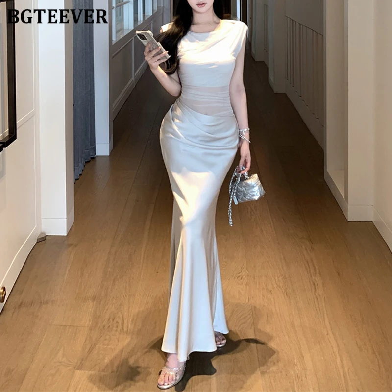 BGTEEVER فستان صيفي أنيق للسيدات نحيف مرقع من الساتان أنيق برقبة دائرية للنساء بدون أكمام فستان الورك