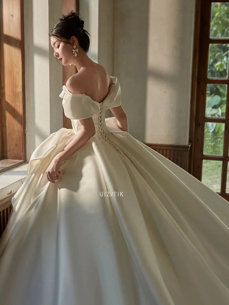 فساتين زفاف بيضاء فاخرة من الساتان للنساء 2026 فستاين سهرة/فساتين الحفلات بدون أكتاف وأربطة طول الأرض Vestidos De Novia مصنوعة حسب الطلب
