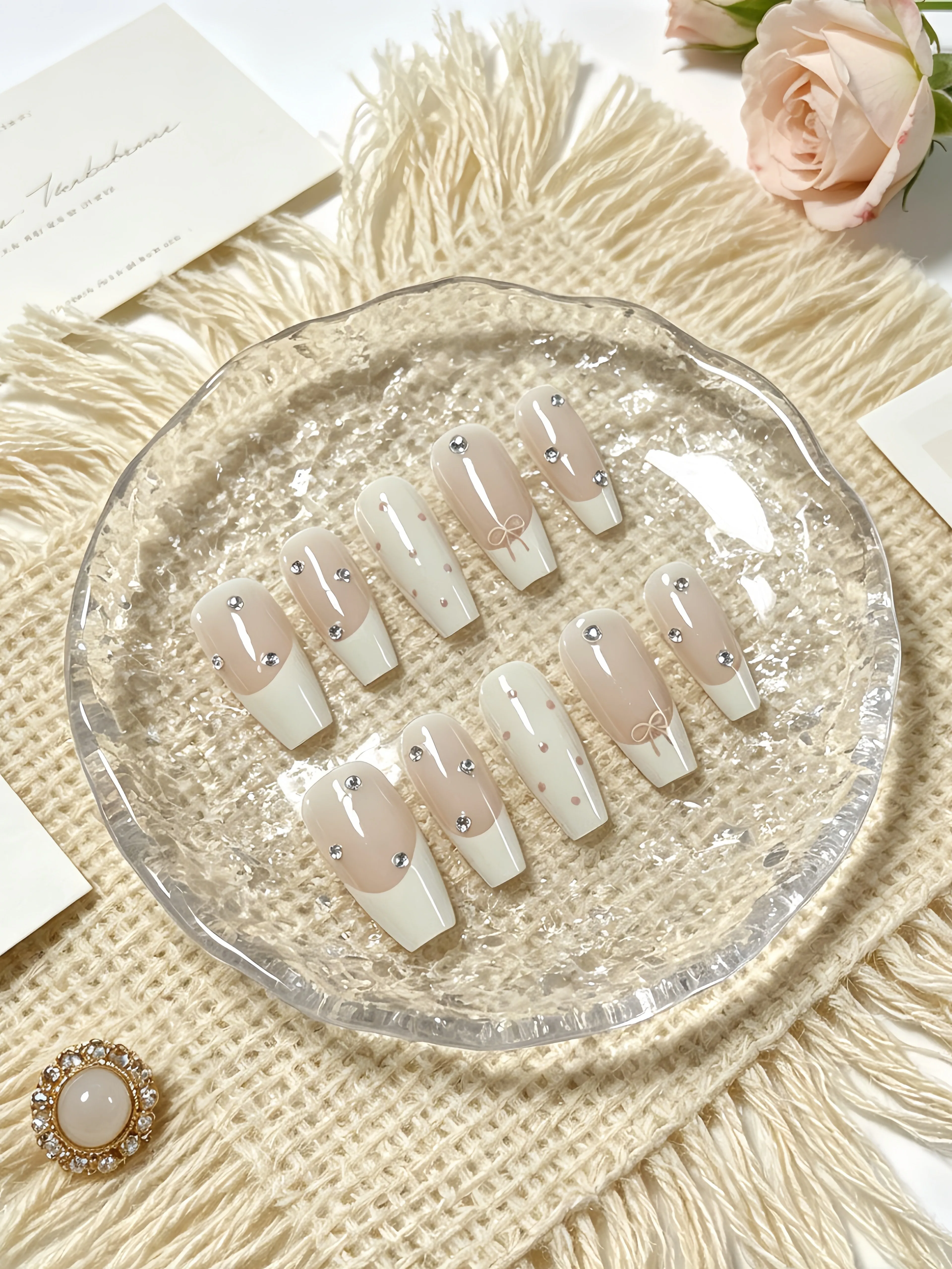 10 Medium-Length Trapezoidal Press-On Nails, Mainly in Milky White and Nude Pink, with Bowknot, Rhinestones, Polka Dots, and French-Style Outlining for Embellishment, Suitable for Daily Study, Work, Typing, Birthday, Bridesmaid Looks, Dating, Photography, and Girl Gatherings. a Gentle and Sweet Style Nail Art Piece, Suitable for Mature and Sweet Girls, Students, Campus Life, Celebrations, and Everyday Low-Key Life. Includes One Jelly Glue and One Nail File