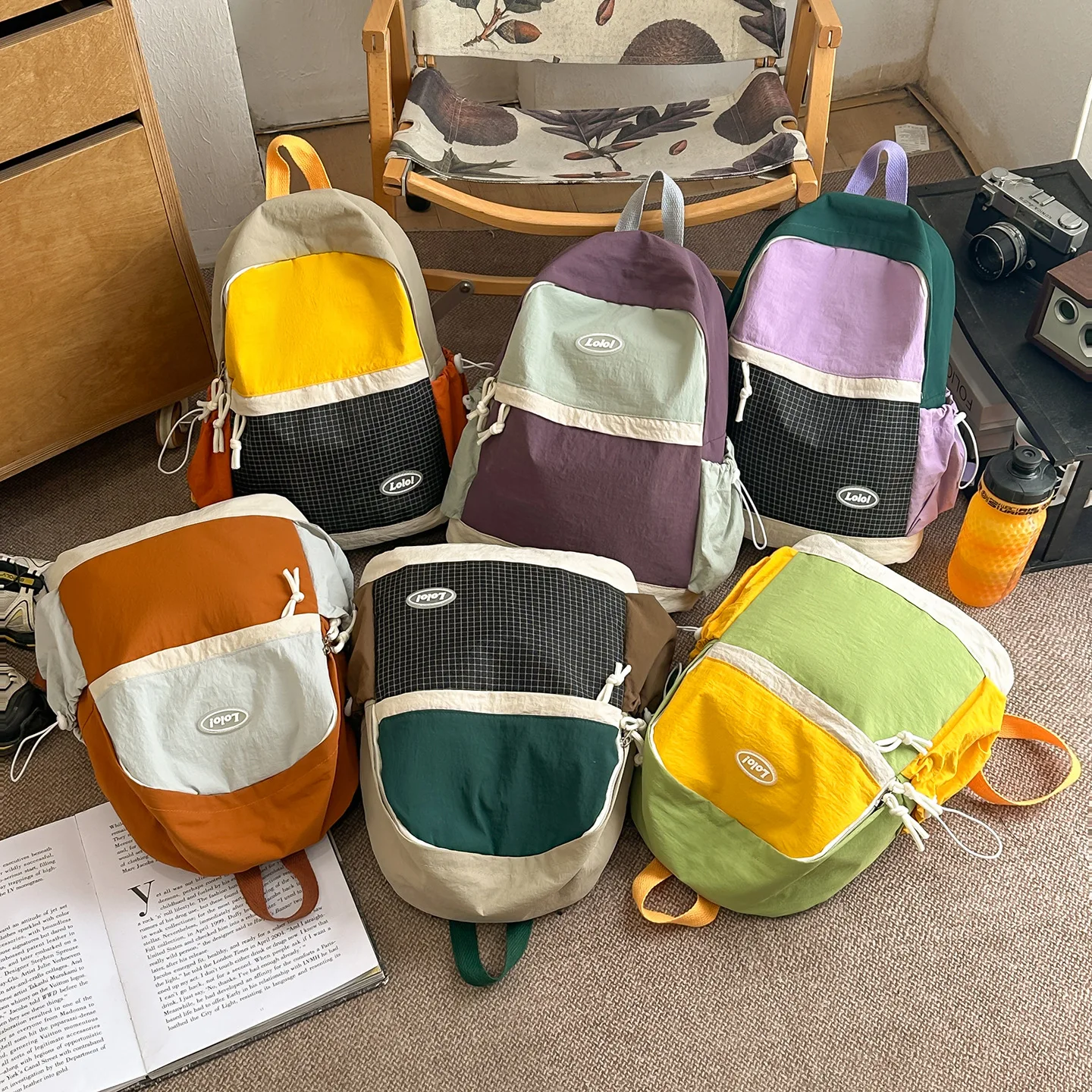 Nylon ultra-light student schoolbag with color-blocking splicing, lightweight travel and mountaineering backpack
