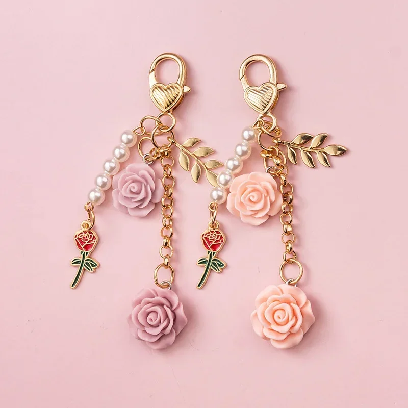 3D Rose camelia portachiavi per auto donna dolce perla nappa fiore portachiavi con decorazione borsa foglia di metallo accessori interni auto