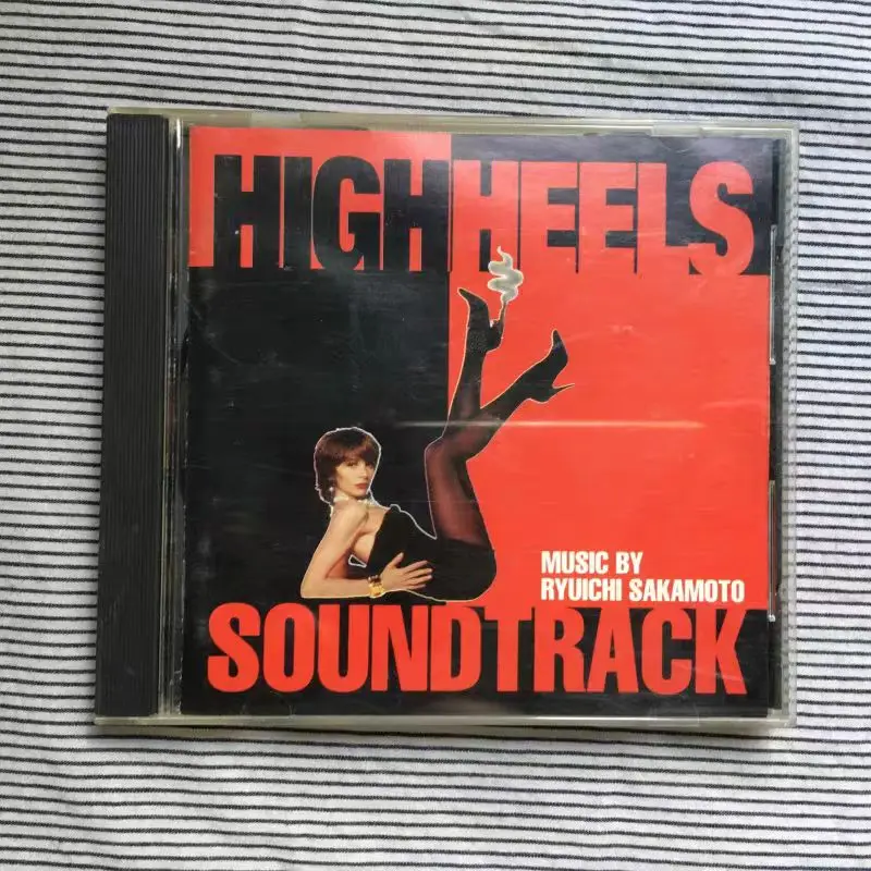 

CD Ryuichi Sakamoto – High Heels (Original Soundtrack) ,1992-01-28 Antilles/Island, Film Score/Classical/Electronic, 20 Tracks