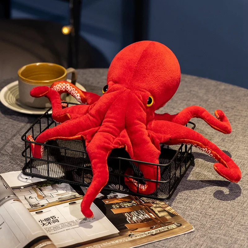 Simulated octopus plush toy in red, super realistic, takes you to experience the charm of the sea and lights up your ocean theme