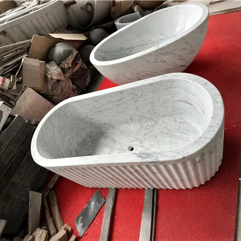 Wholesale Modern Carrara White Marble Bathtub Hand Carved Oval Free Standing Stone Fashion Tub For Bathroom Price