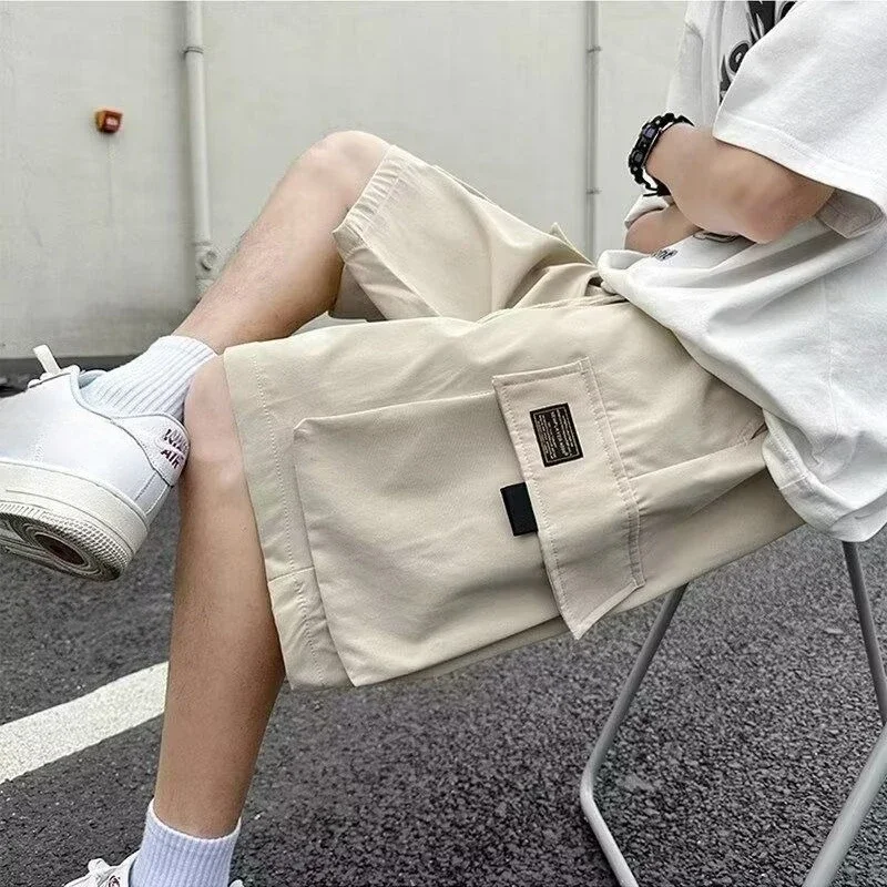 ยาว Baggy พร้อมกระเป๋าเอวยางยืดหลวม Draw String กางเกงขาสั้นสําหรับชายเบอร์มิวดา Half Oversize Mens Cargo กางเกงขาสั้นกว้าง