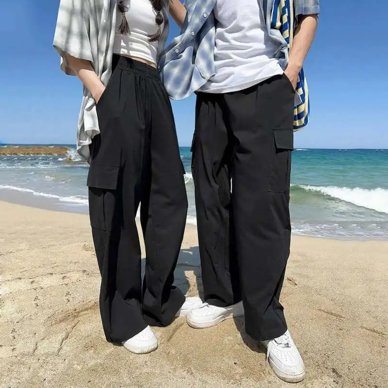 Pantaloni cargo da uomo in vita elastica tinta unita tasca grande laterale abbigliamento da uomo casual pantaloni larghi da uomo a gamba larga Cleanfit P020