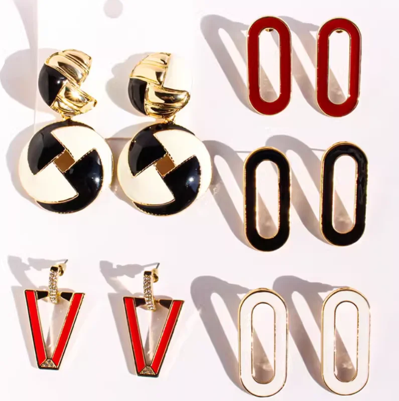 

European and American style New Year red and black enamel oval earrings Flash diamond geometric triangle earrings exaggerated ea
