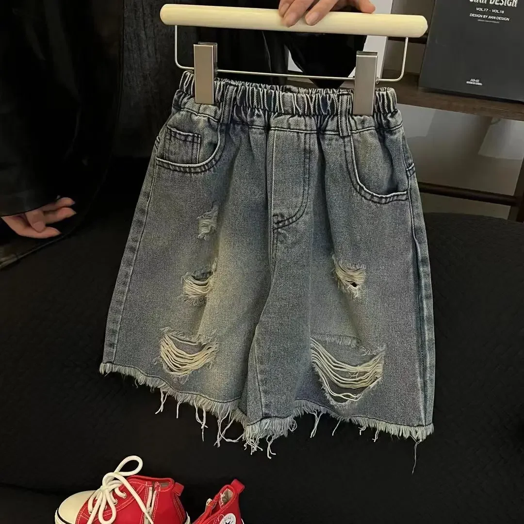 Children's Summer Set Fashionable 2026 New Boys' Graffiti Round Neck Short sleeved T-shirt+Piercing Cowboy Shorts Two-piece Set