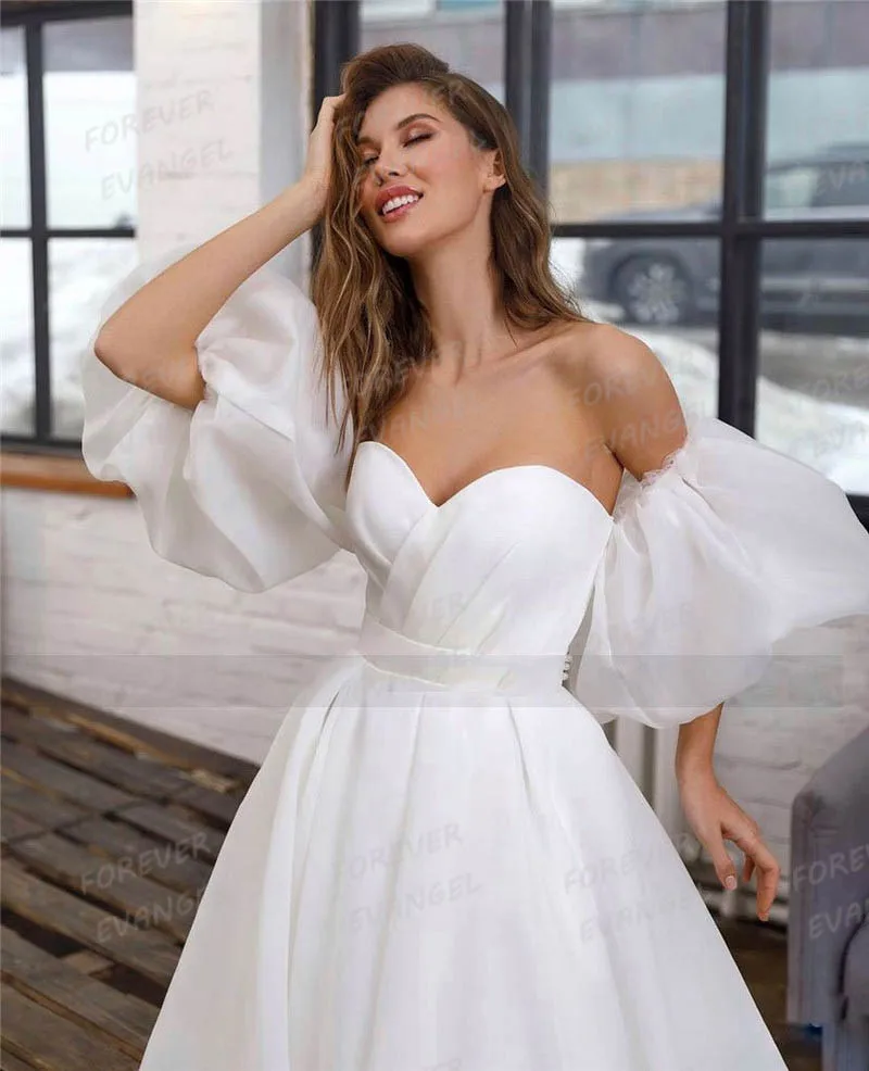 Luksusowe suknie ślubne dla kobiet A Line Sexy Short Puff Sleeve Backless Sweetheart Bride Gowns Party Vestidos De Novia Gala 2025