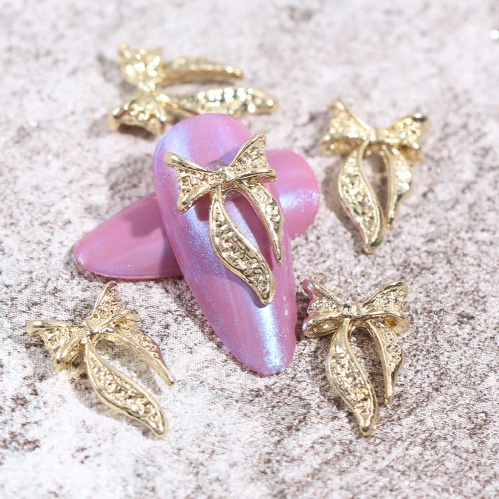 100 sztuk łuk wiertła do paznokci 3D Charms naklejki akcesoria dżetów przedmioty dekoracyjne DIY Manicure naszywki paznokci początkujący ekspert