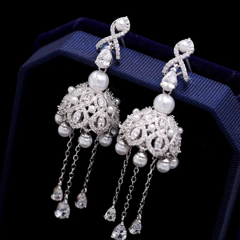 

European and American exaggerated retro wind chimes fringed pearl bells earrings for women