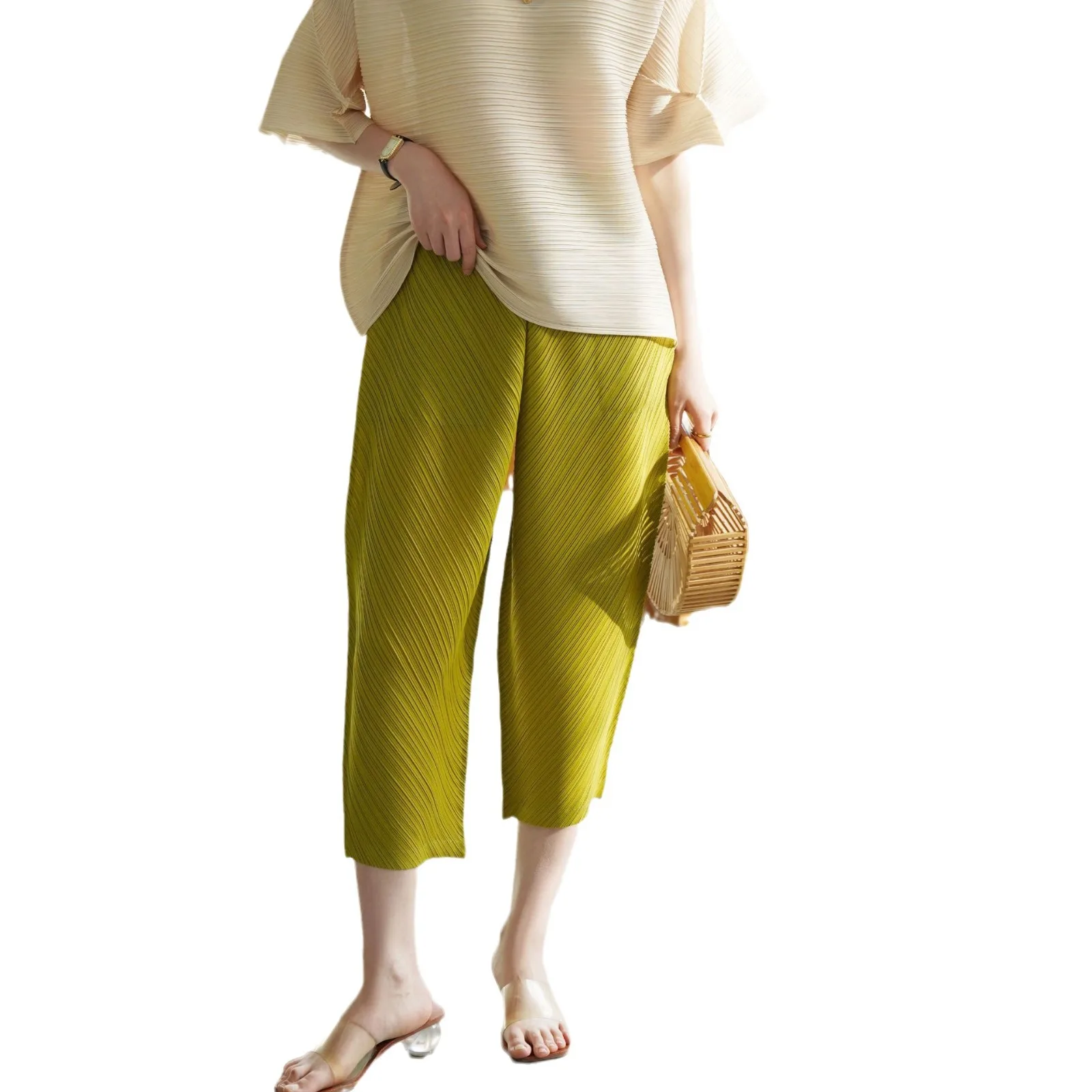 2025 Miyake novedad de verano de gama alta doblada grande suelta Casual Haren pantalones moda versátil Color sólido cómodo nueve Cent pantalones