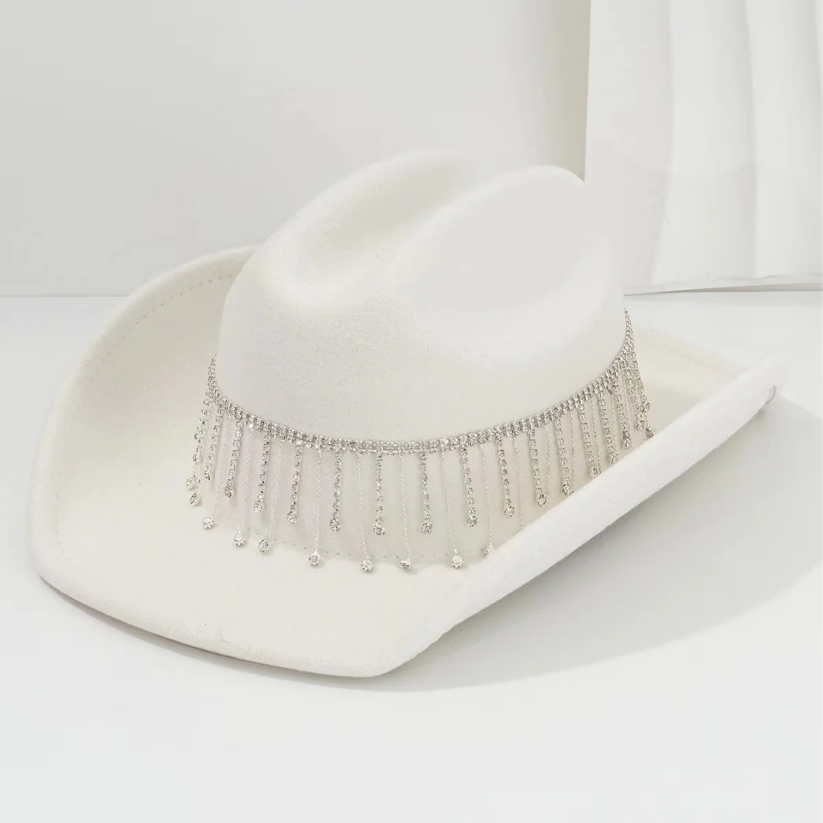 A delicate tasseled cowboy hat top hat in different colors, suitable for denim parties, bachelorette parties, Burning Man