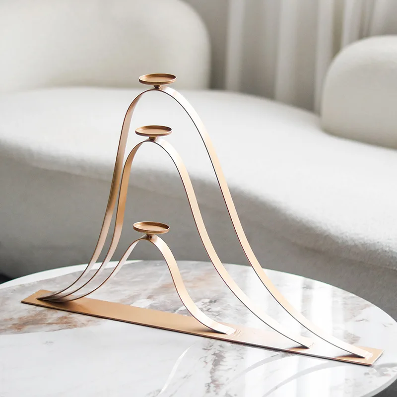 Modern model room, dining room table ornaments, creative light luxury soft decorations, European metal art, three-layer candle h