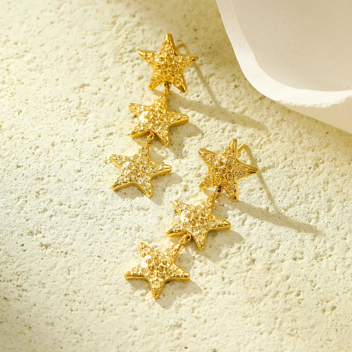 High-end stainless steel five-pointed star hammered design stud earrings - simple and elegant star-shaped earrings