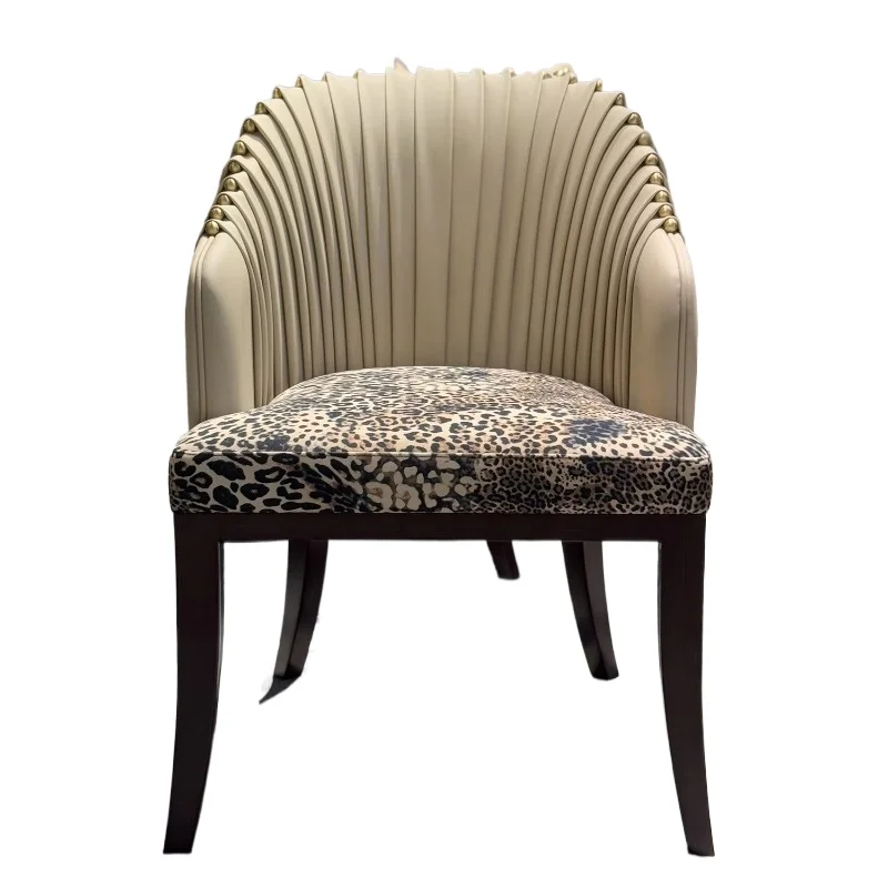 Leather and velvet dining chairs with brass studs, pleated backrests, upholstered seats, wooden legs, kitchen chairs