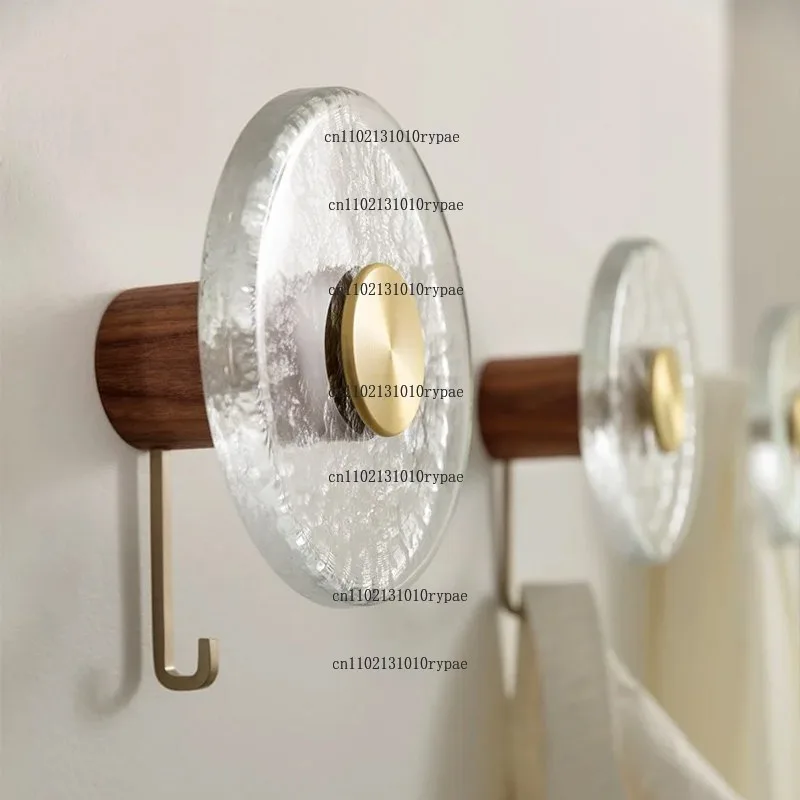 clothes hanger for entryway background wall, featuring glass craftsmanship, walnut wood, brass decorations and ornaments
