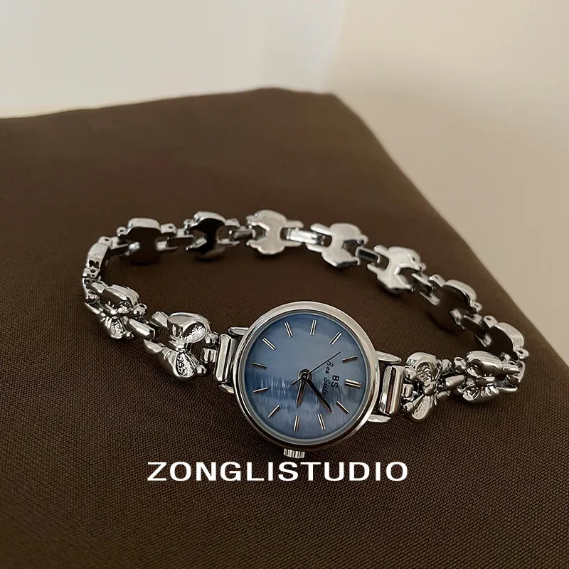 New Minimalist, Stylish, And Exquisite Light Luxury Women'S Watch With Blue Mother-Of-Pearl Dial And Silver Butterfly Design.