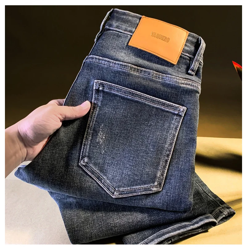 

Модные мужские джинсы в американском стиле весной и осенью, приталенный крой, эластичный, на маленьких ногах, с вырезами и рваными дырками, длинные брюки.