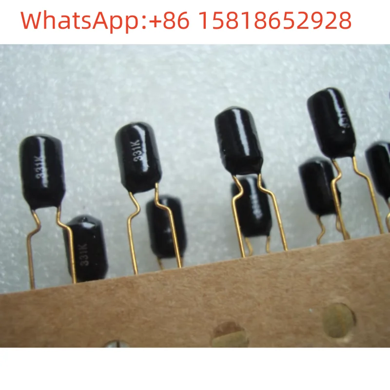 

2pcs 100V 330PF (331) Japan Amtrans black lacquer gold-plated audio non-polar capacitor