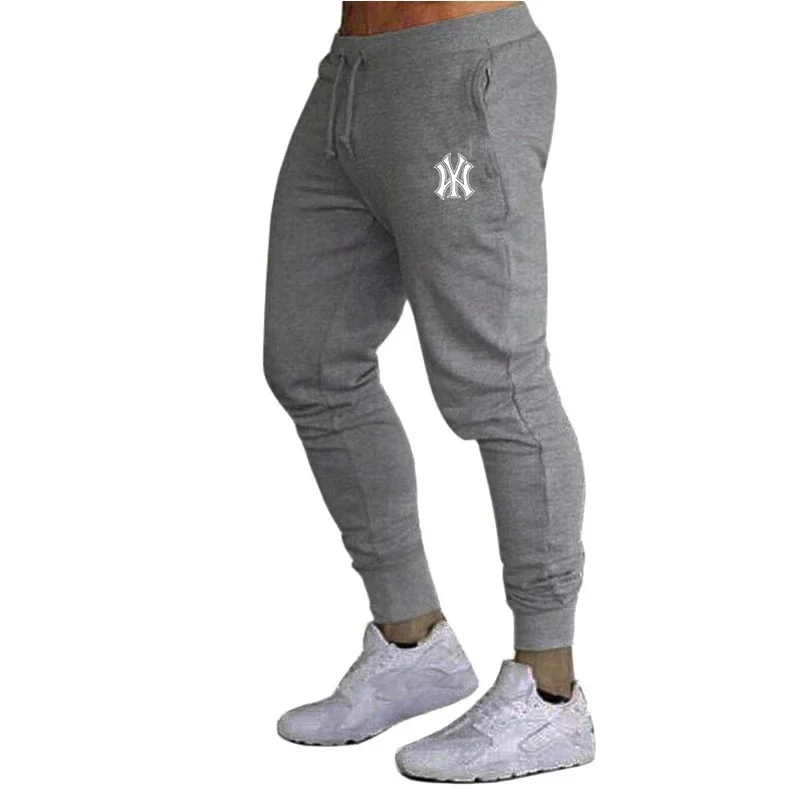 ชายกางเกงฤดูร้อนสบายๆกางเกงใหม่ผู้ชายเสื้อผ้าฟิตเนสกีฬา Jogging Tracksuits Sweatpants Harajuku Streetwear กางเกงบาง