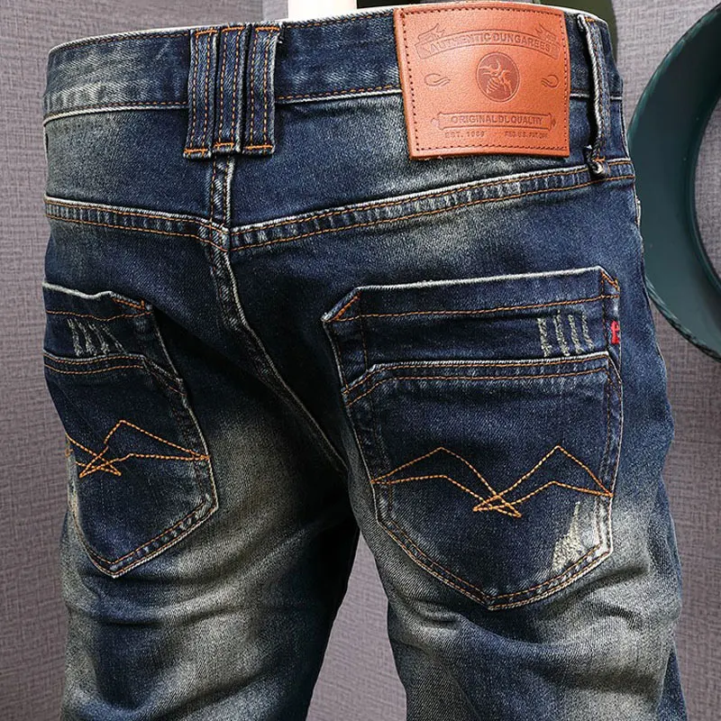 Fashionable new men's jeans elastic slim fit perforated patch washed water blue jeans designer retro pants hombre