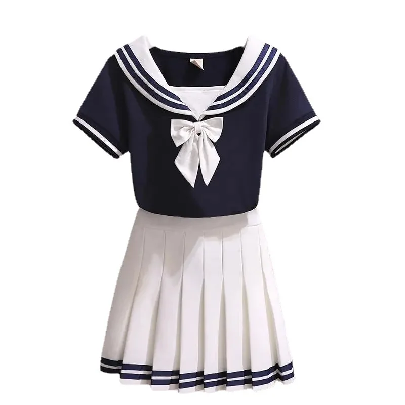 Uniforme JK blanco y negro de verano para niñas, camisa de manga corta + faldas plisadas, uniformes escolares japoneses, falda estilo azul marino, conjunto de dos piezas