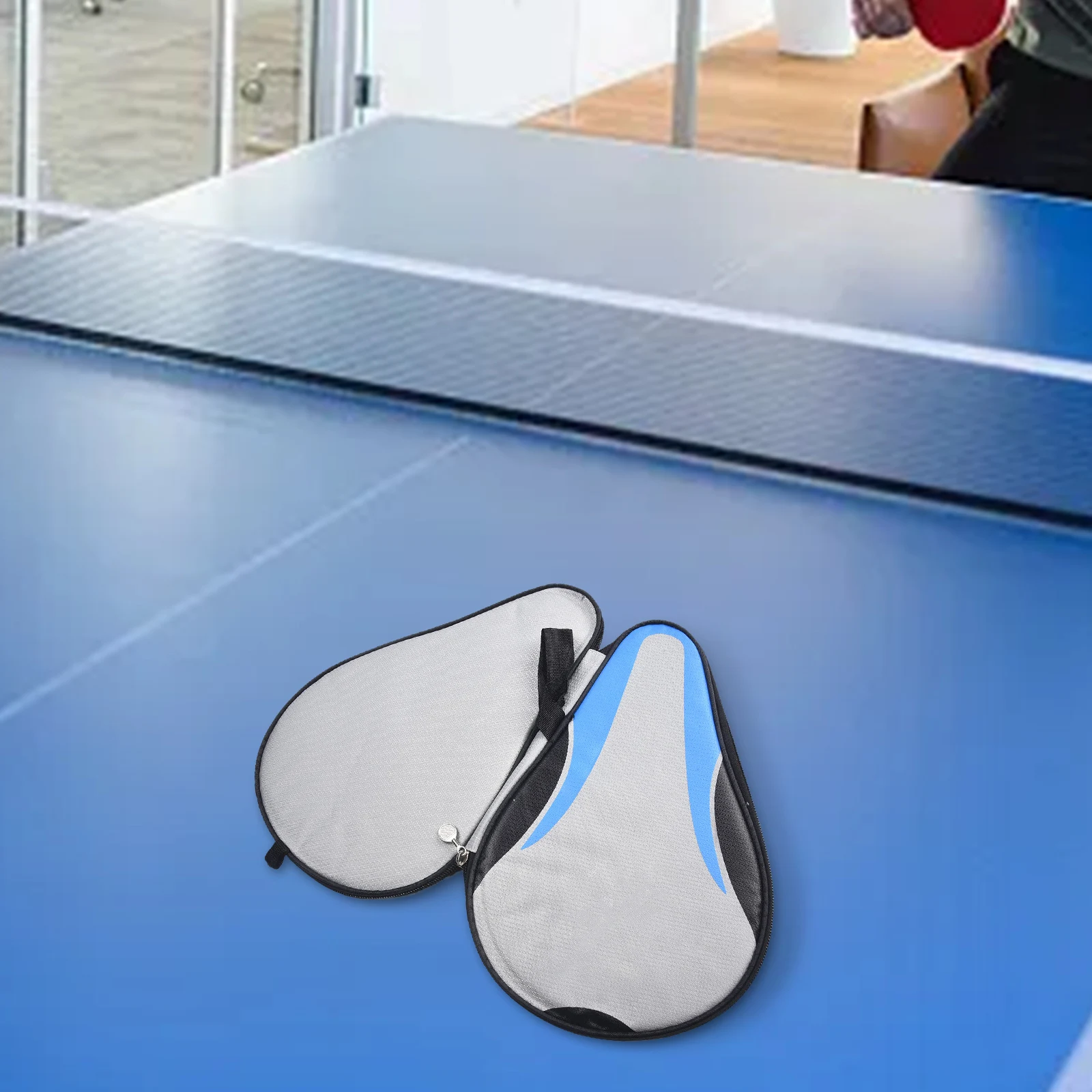 

Сумка для ракеток для настольного тенниса с пенопластовой подкладкой и чехлом из ткани Оксфорд, оснащенная ручкой для удобной переноски.