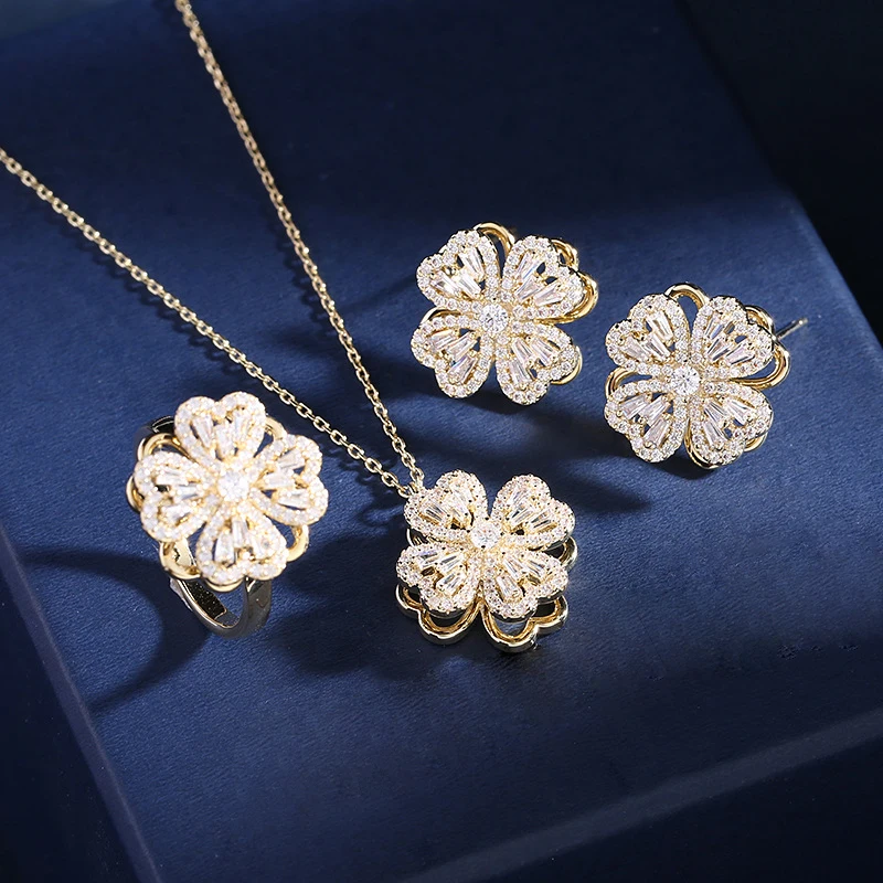 Set of 3 Luxurious Rotating Flower Pendant Necklaces - Women's Spinning Shamrock Gold-Plated Stainless Steel Jewelry