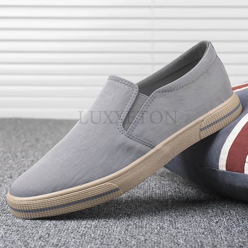 Leisure Men\'s Shoes in The Spring of The New Joker Low Help Sandals Breathable Soft Bottom Lazy Canvas Shoes Men Vulcanized