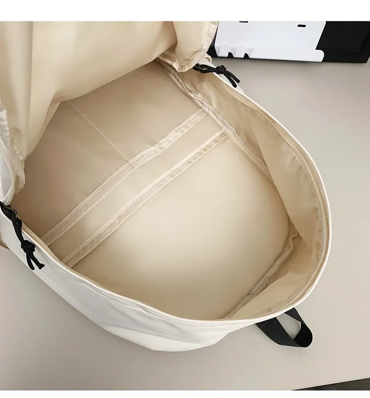 حقيبة ظهر عالية الجودة ذات سعة كبيرة بلون نقي حقيبة كتب مدرسية عالمية لطلاب الجامعات الابتدائية والثانوية