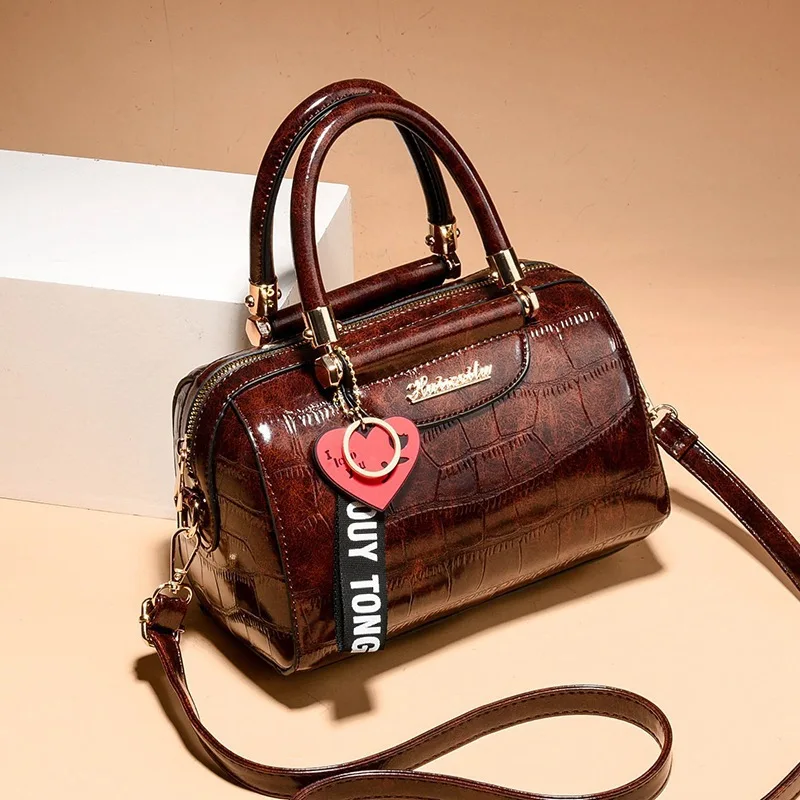 

Vintage Embossed Leather Satchel Chic Brown Handbag with Top Handle & Adjustable Crossbody Strap, Perfect for Everyday Casual