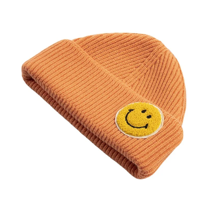 2022 New Fashion Winter Happy Face Acrylic Beanie Embroidery Logo Solid Color Knit Beanie Hats For Daily